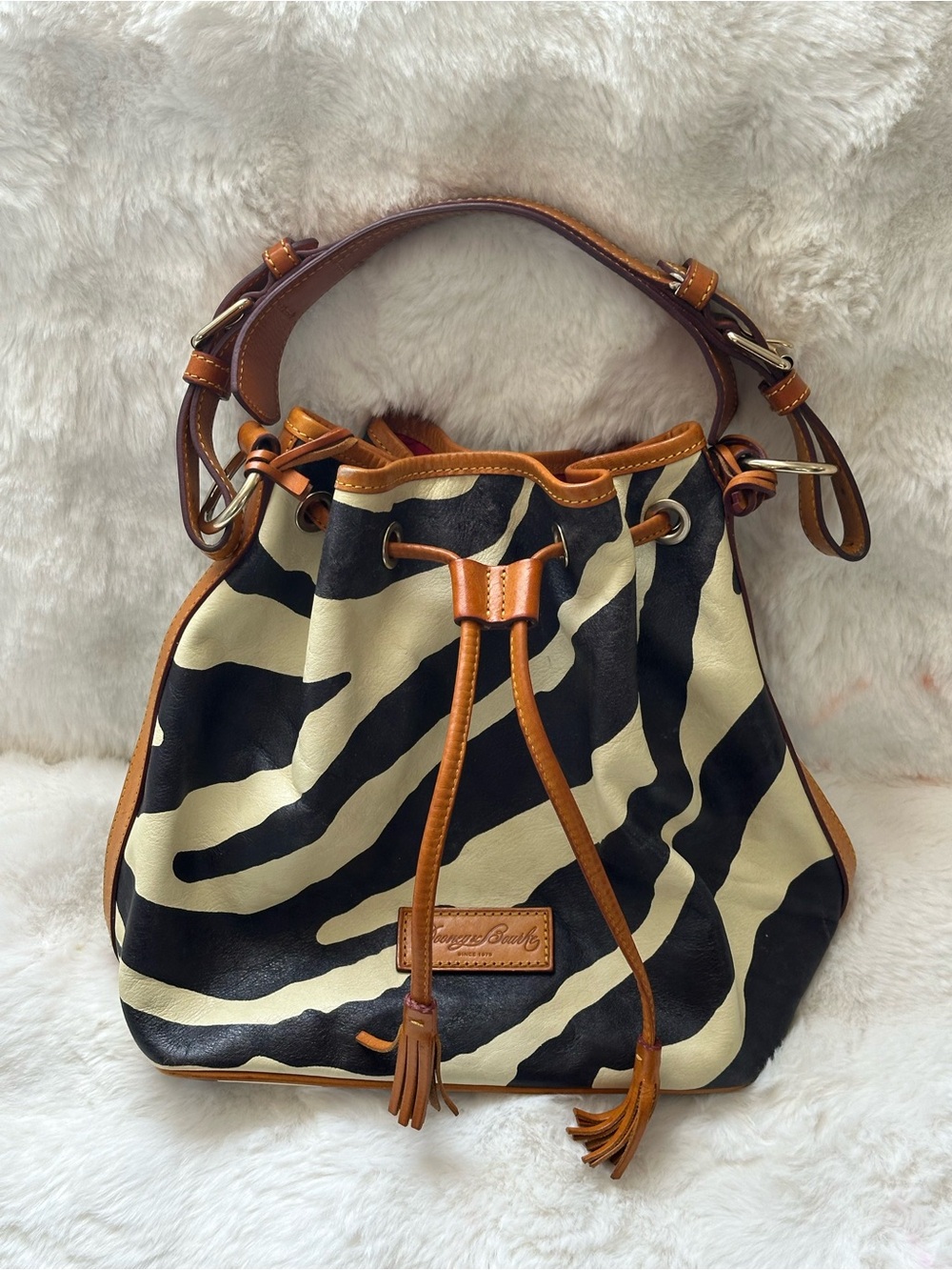 Dooney & Bourke Black & Cream Zebra Drawstring Bucket Bag with Tan Trim
